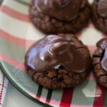 Chocolate almond joy cookies on plate.