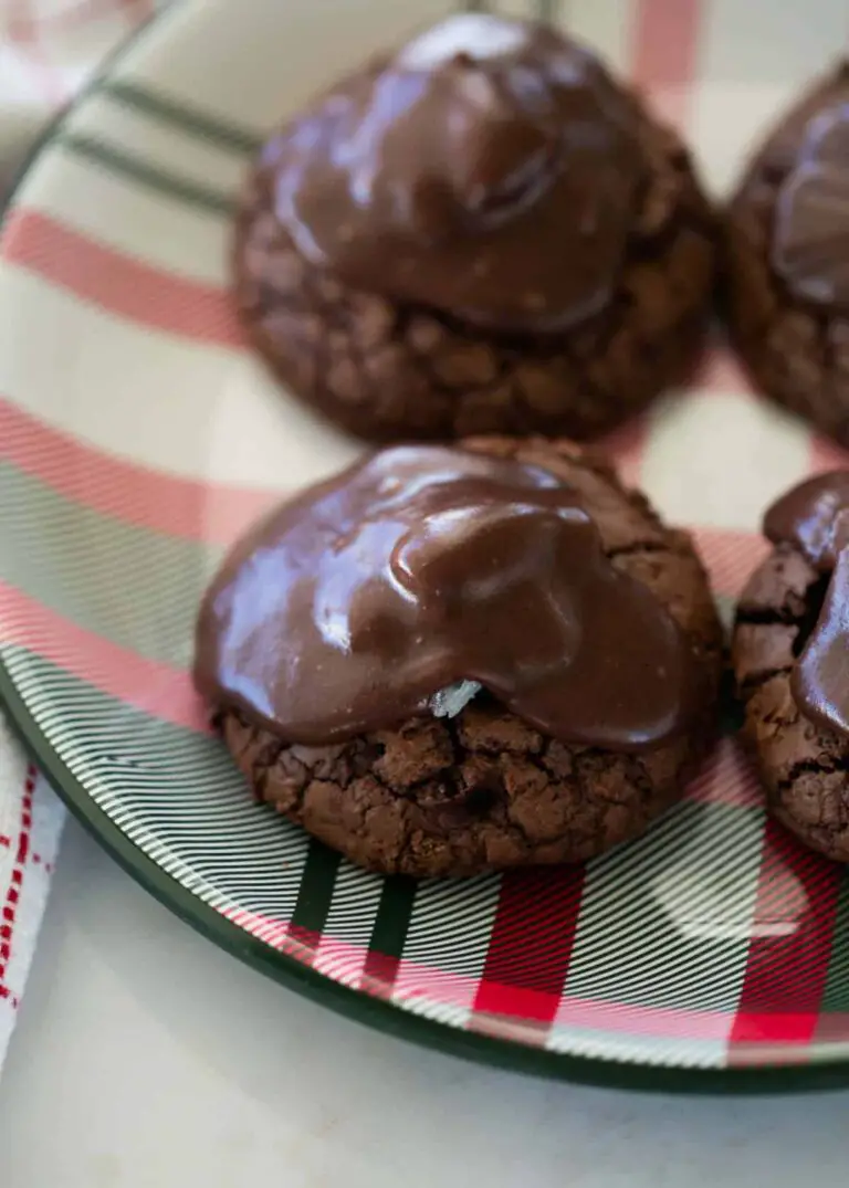 Chocolate almond joy cookies on plate.