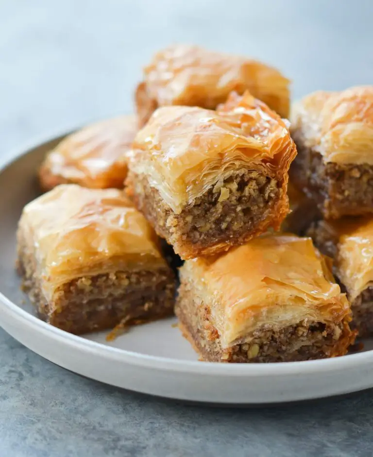 Baklava piled on a plate.