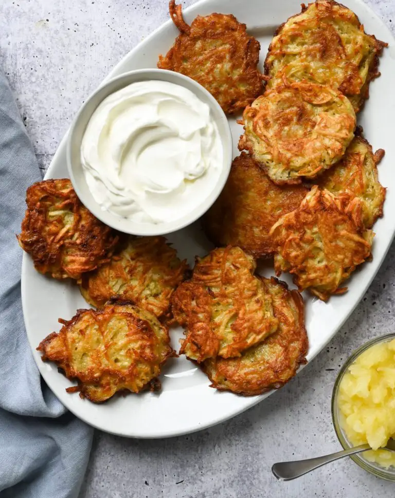 Platter of latkes and sour cream.