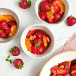 orange and strawberry salad in bowls