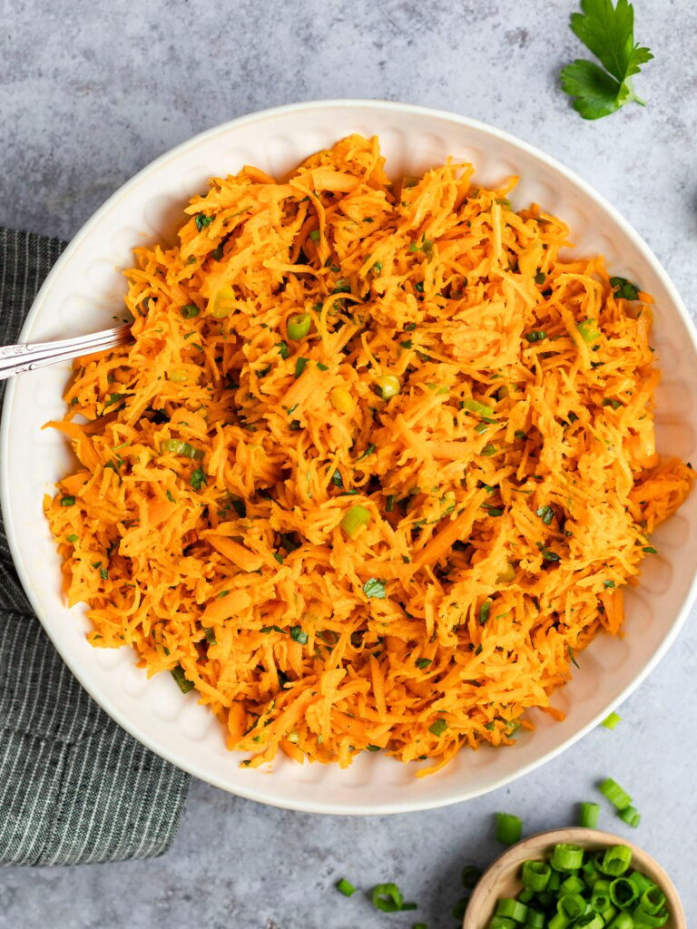 carrot salad in white bowl