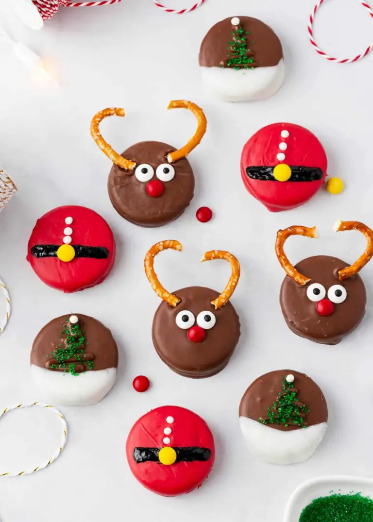 Christmas Oreos covered in chocolate and decorated.